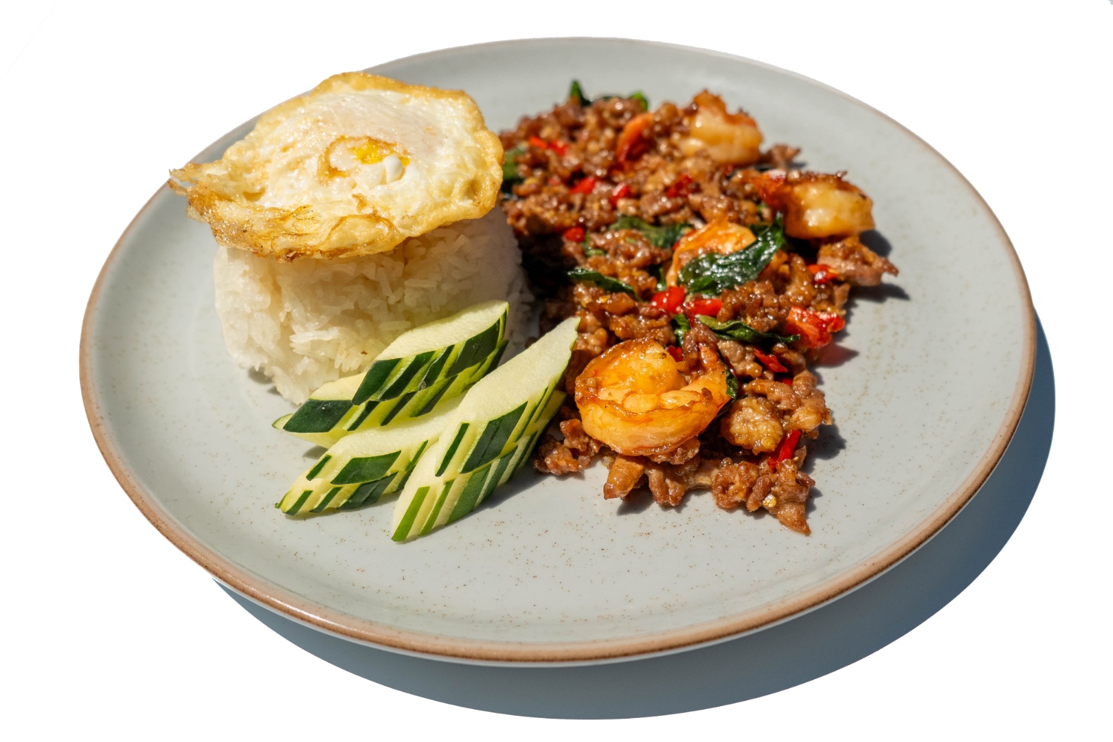 Basil Chili Wok Signature with minced meat, prawns, rice, fried egg, and cucumber